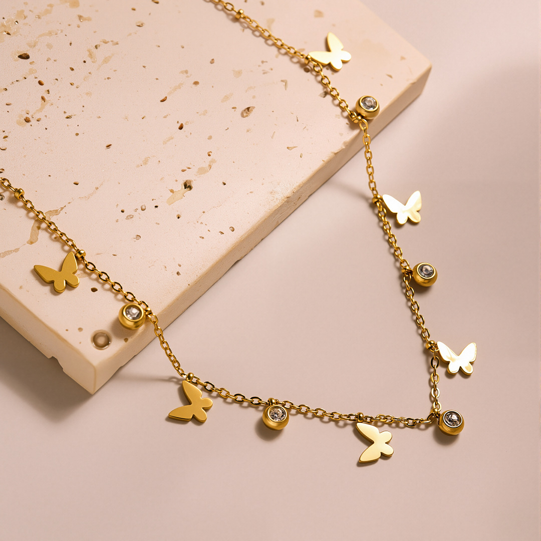 Колье-бабочка с кисточкой из н – обзор и цена Butterfly Clasp Deployant
